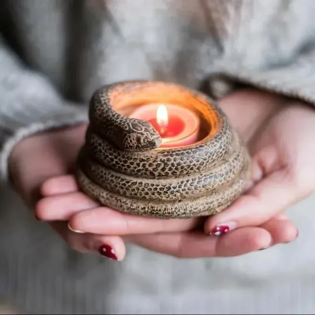 Creative concrete candlestick with snake symbol - symbol of happiness and protection