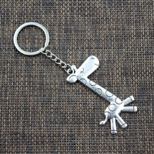 Keychain with giraffe and deer in ancient bronze and silver color