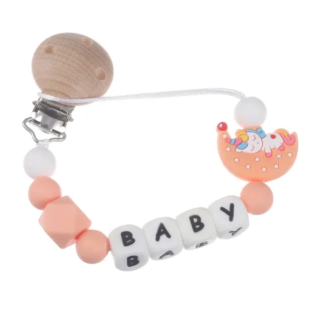 Silicone pacifier clip with motif of moon and bite