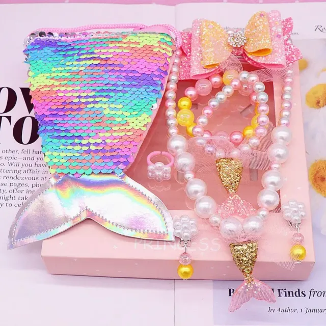 Little girl's slippery purse shaped like a mermaid and pearl accessories