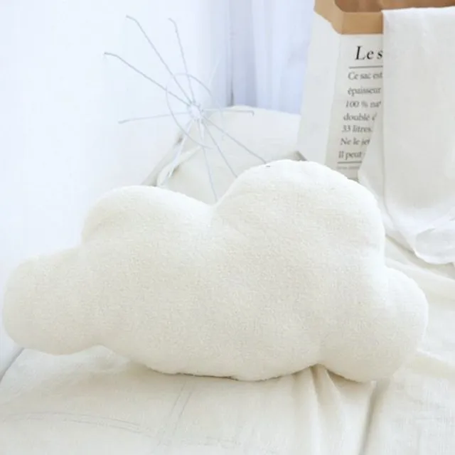 Baby pillow in the shape of a cloud