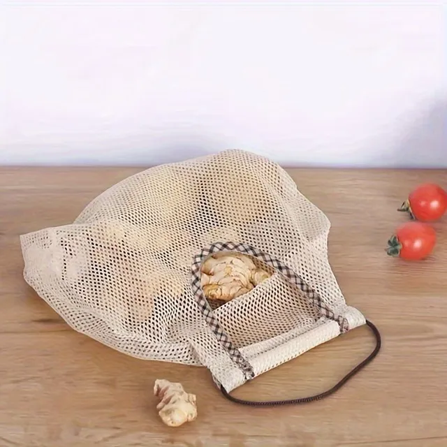 Hanging net bag for fruit and vegetables in the kitchen with a hang-up handcuff