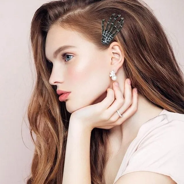 Hair clip with hand skeleton