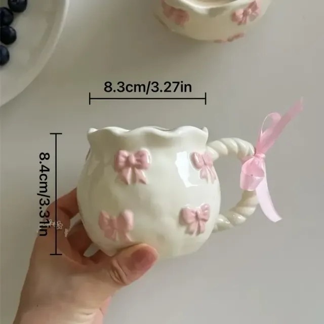 Handmade ceramic mugs with irregular bow patterns - ideal for home cooking