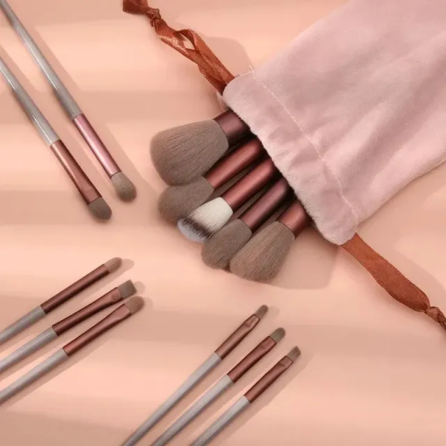 Set of fine and fluffy cosmetic brushes for applying make-up, powder, lipstick and shadows