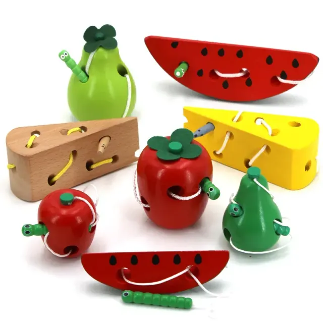 Fun wooden toy shaped fruit with worm on worm for sensory training