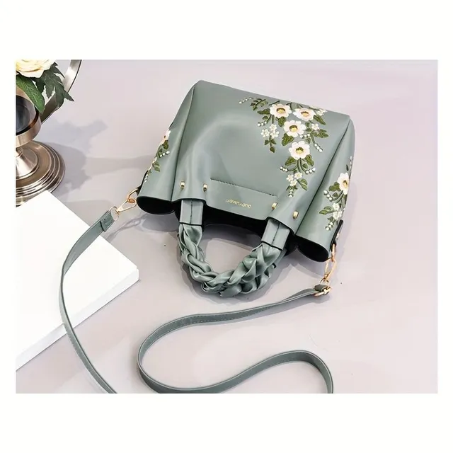 Elegant bag with floral embroidery and removable strap