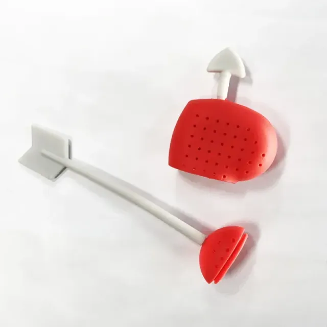 Designed silicone tea sieve in the shape of a heart pierced with an arrow of love