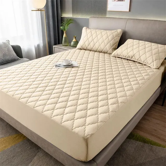 Waterproof mattress protector with rough padding and pleasant household fabric