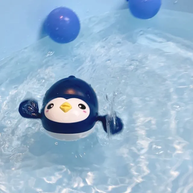 Swimming penguin for bath or swimming pool