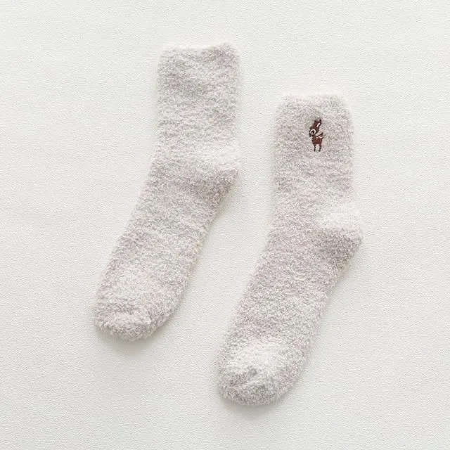 Warm socks in the shape of a paw