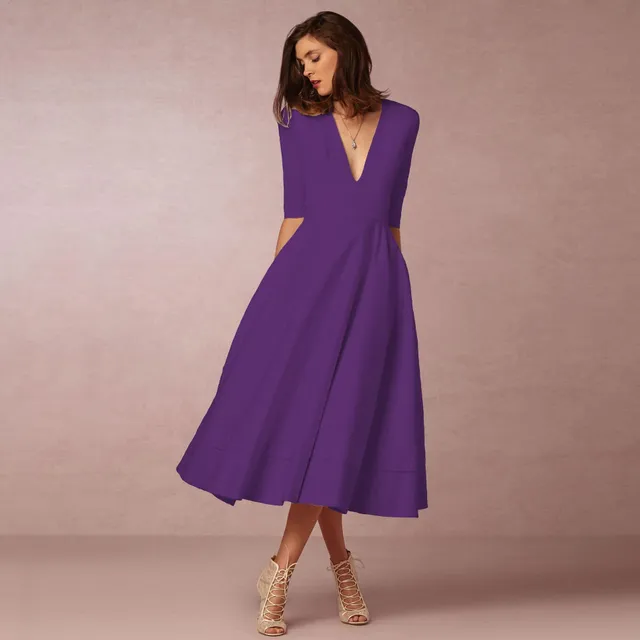 Robe Midi Flowy à décolleté plongeant élégante