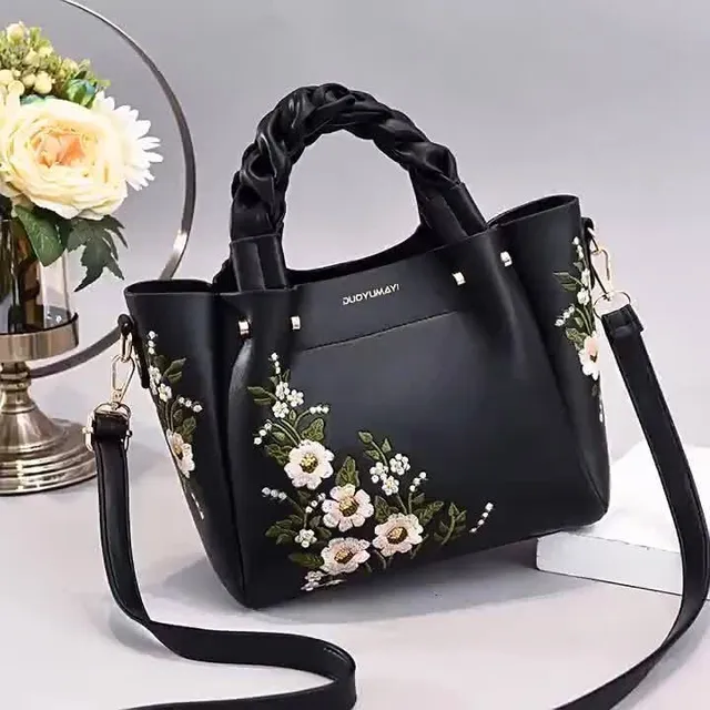 Elegant bag with floral embroidery and removable strap