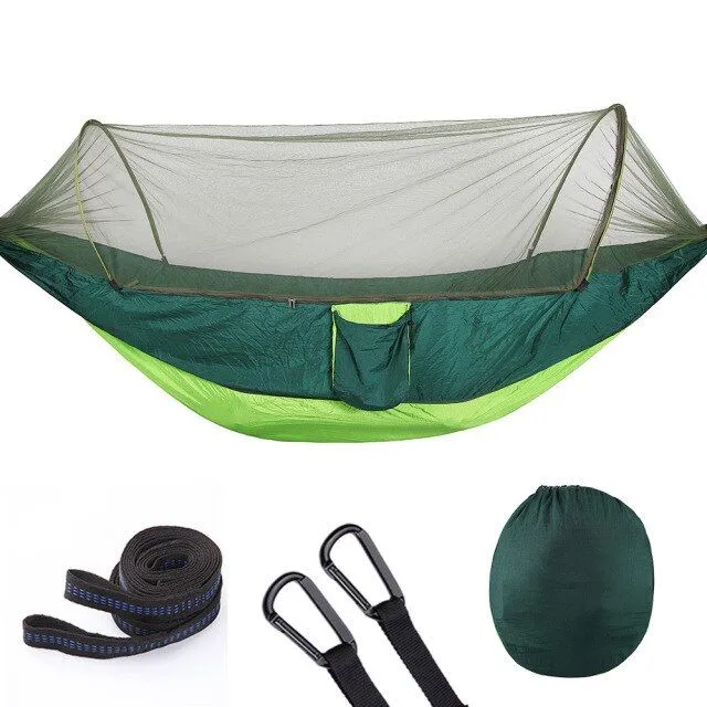 Outdoor hammock with automatic quick opening and mosquito net