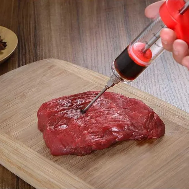 Filling syringe for meat