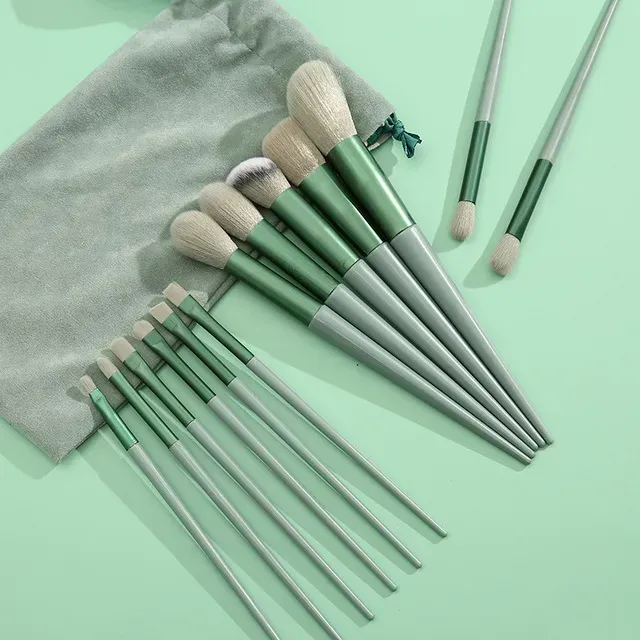 Set of fine and fluffy cosmetic brushes for applying make-up, powder, lipstick and shadows