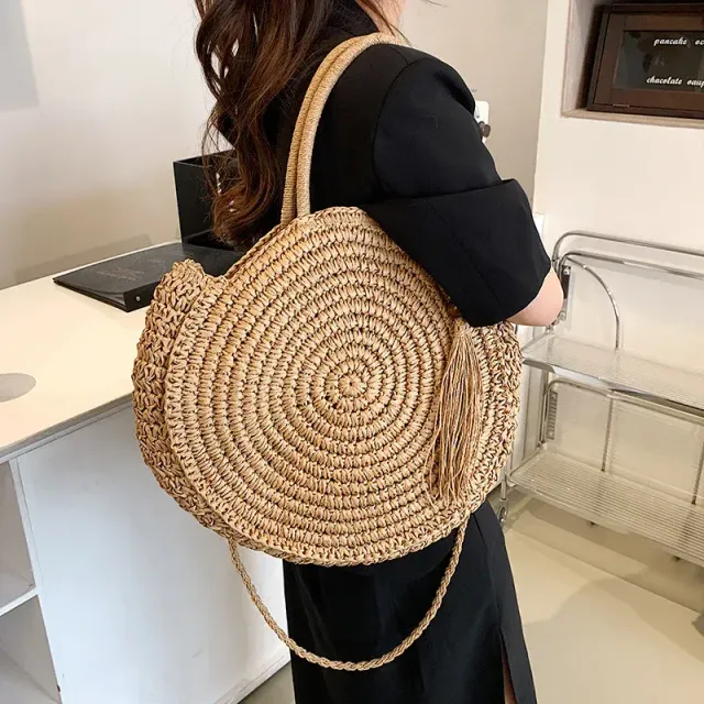 Summer round straw bag with holes in boho style for women