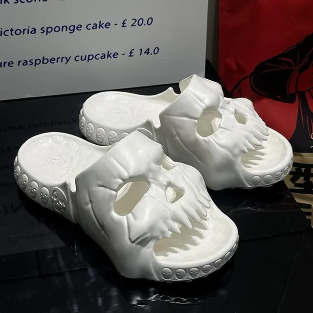 Design slippers with skull