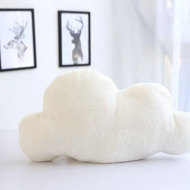 Baby pillow in the shape of a cloud