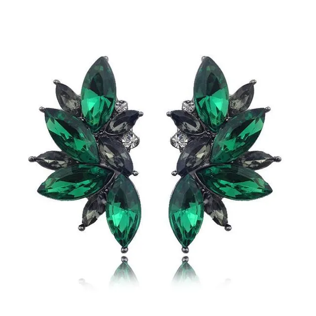 Extravagant shiny earrings with rhinestones