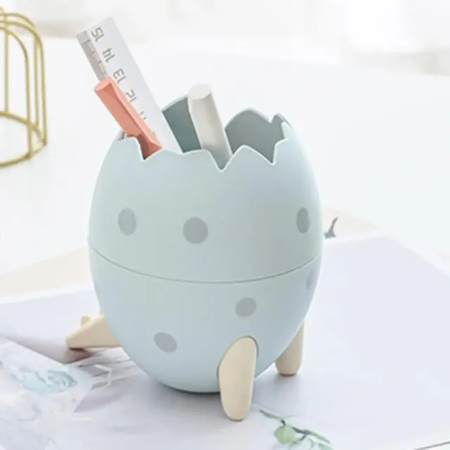 Design holder for pencils and brushes in the shape of a dinosaur egg - several color variants