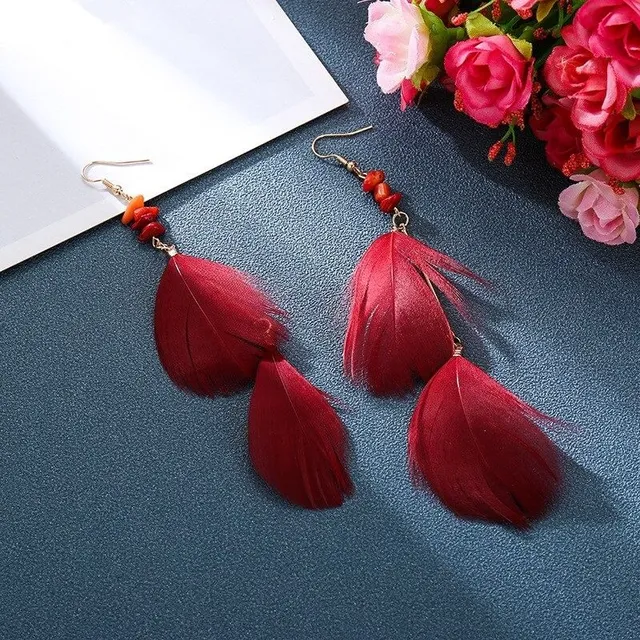 Women's dangle earrings with feathers