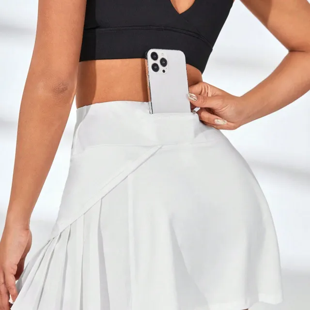 Tennis skirt with a wide ribbon in the waist and a volley line for active movement