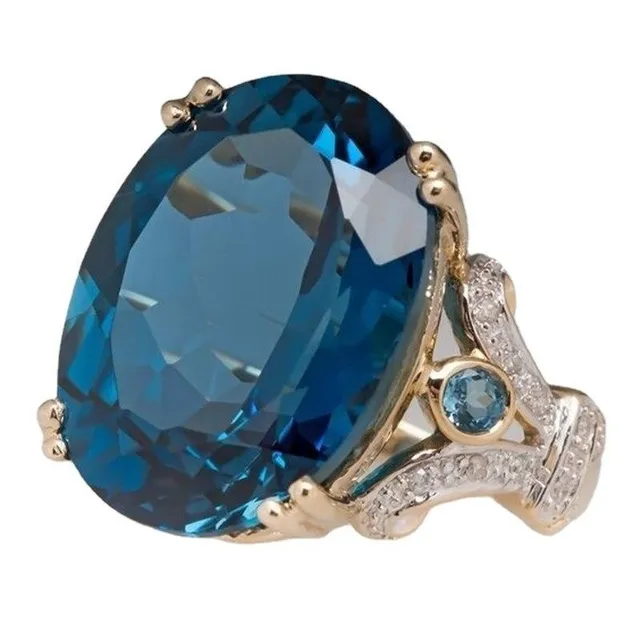 Extravagant luxury chunky ladies ring with large blue cubic zirconia Ryan