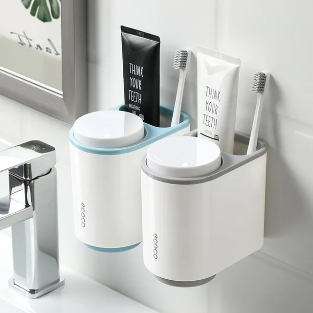 Toothpaste dispenser with toothbrush holder and paste