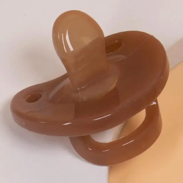 Silicone pacifier for newborns in brown color