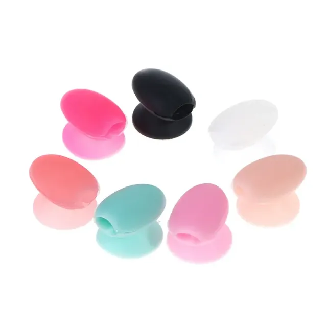 Practical silicone cover with suction cup for lip gloss applicators and eye shadows