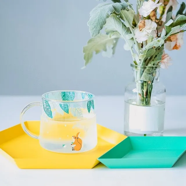 Glass mug with animals