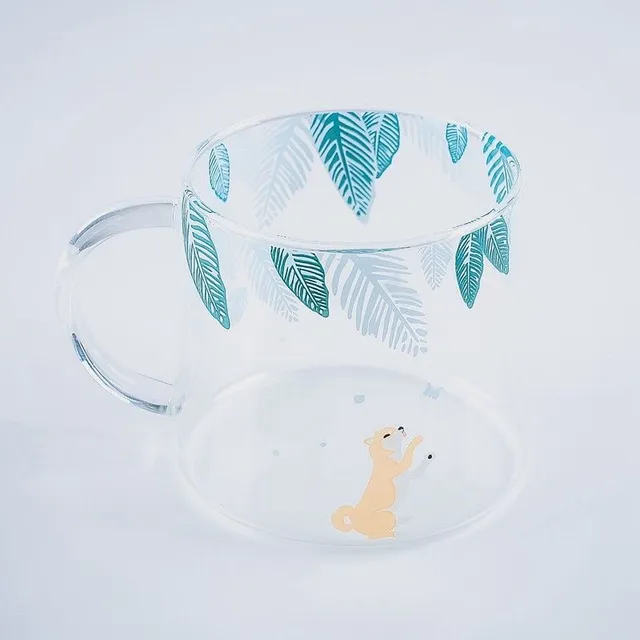 Glass mug with animals