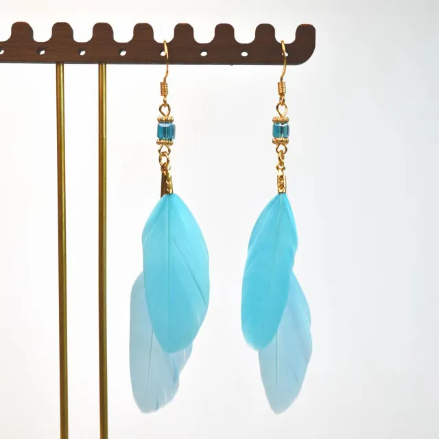 Boucles d'oreilles pendantes pour femmes avec plumes