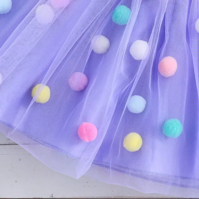 Girl's tutu skirt in tulle with colourful plush balls