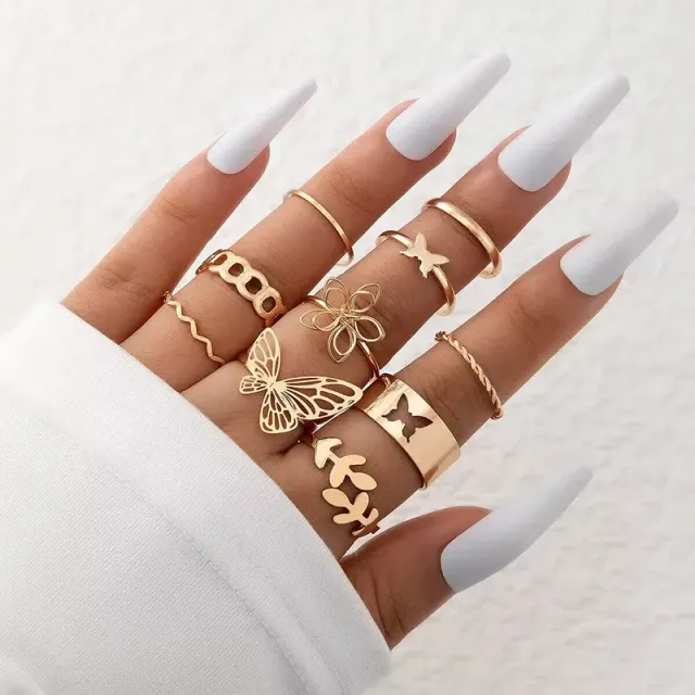 Set of 6-10 geometric rings with butterflies