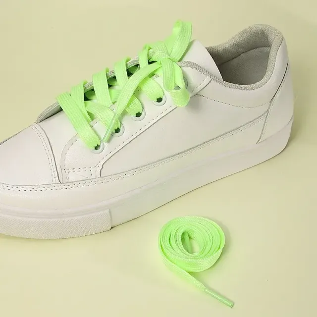 Fluorescent shoelaces in monochrome design