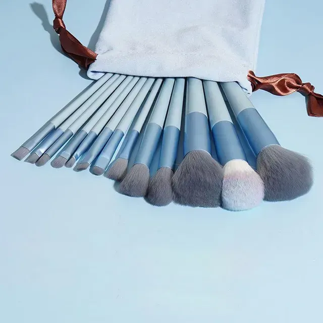 Set of fine and fluffy cosmetic brushes for applying make-up, powder, lipstick and shadows