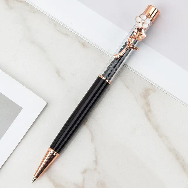 Designer office pen with luxurious flower-shaped decoration and glitters