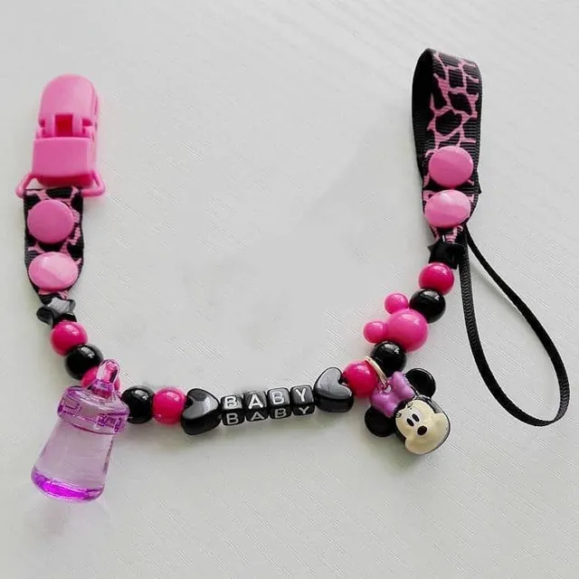 Toy with pacifier necklace © Babysitters