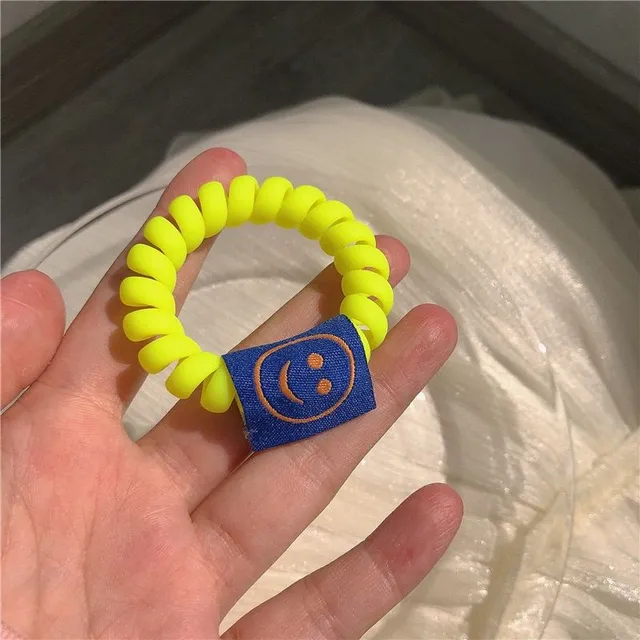 Fluorescenční spirálová gumička se smajlíkem