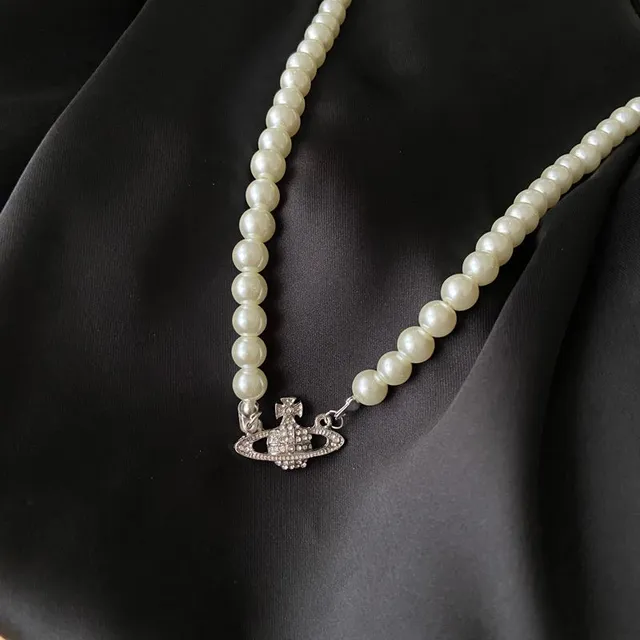 Saturn pearl necklace