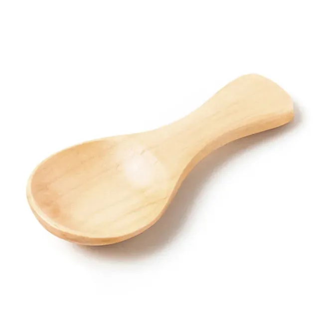 Wooden teaspoon, honey, coffee, spices and other kitchen ingredients