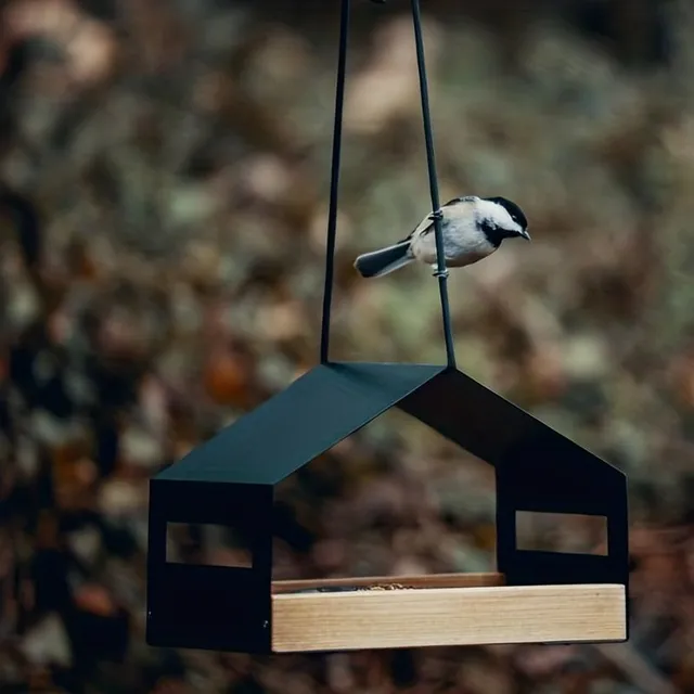 Hanging bird's nest with feeder for hummingbirds - garden decoration