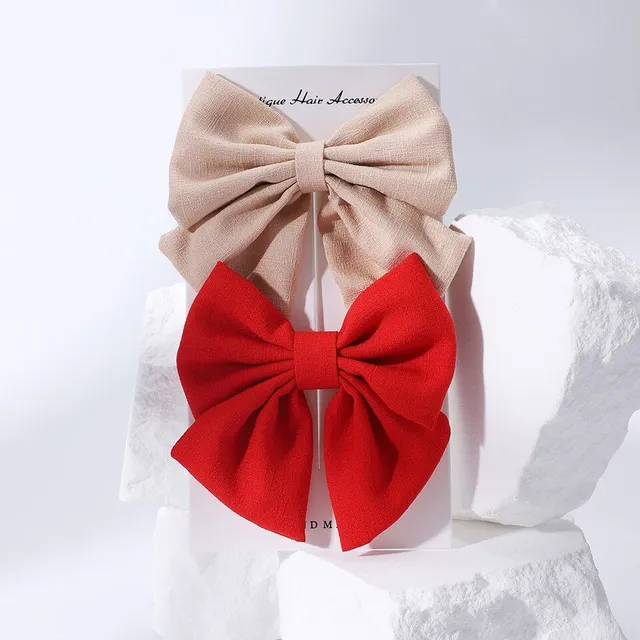 Cute modern baby hair clip with perfect bow motif - more variants