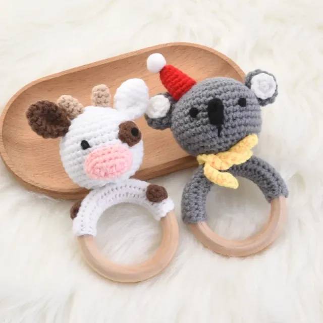 Crochet rattle with cow or koala motif and wooden rings