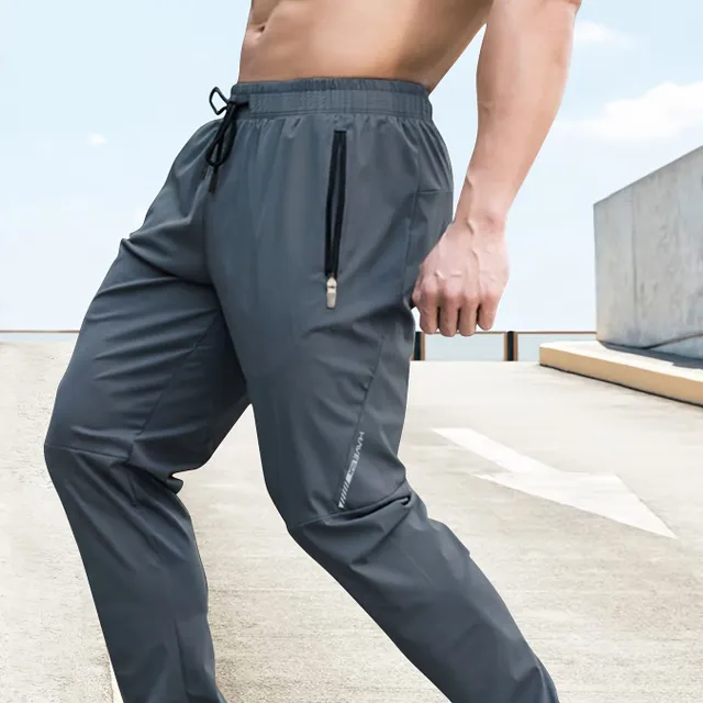 Men's loose-fitting sweatpants with drawstring, suitable for running and jogging, winter and autumn, casual style