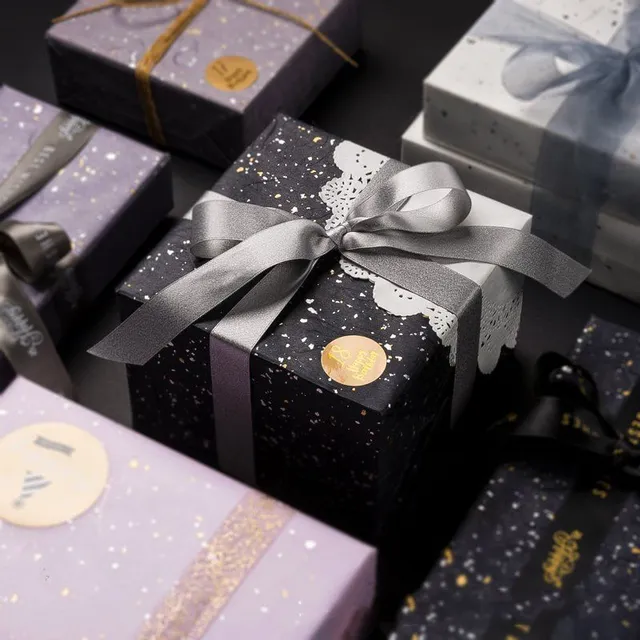 Luxury wrapping paper in pastel colours with metallic detail Danial