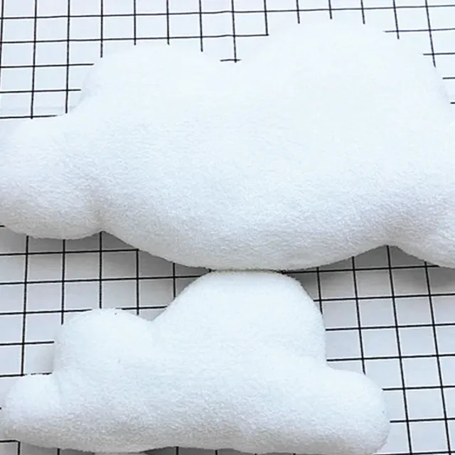 Baby pillow in the shape of a cloud