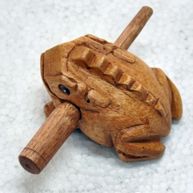 Wooden frog with a cane